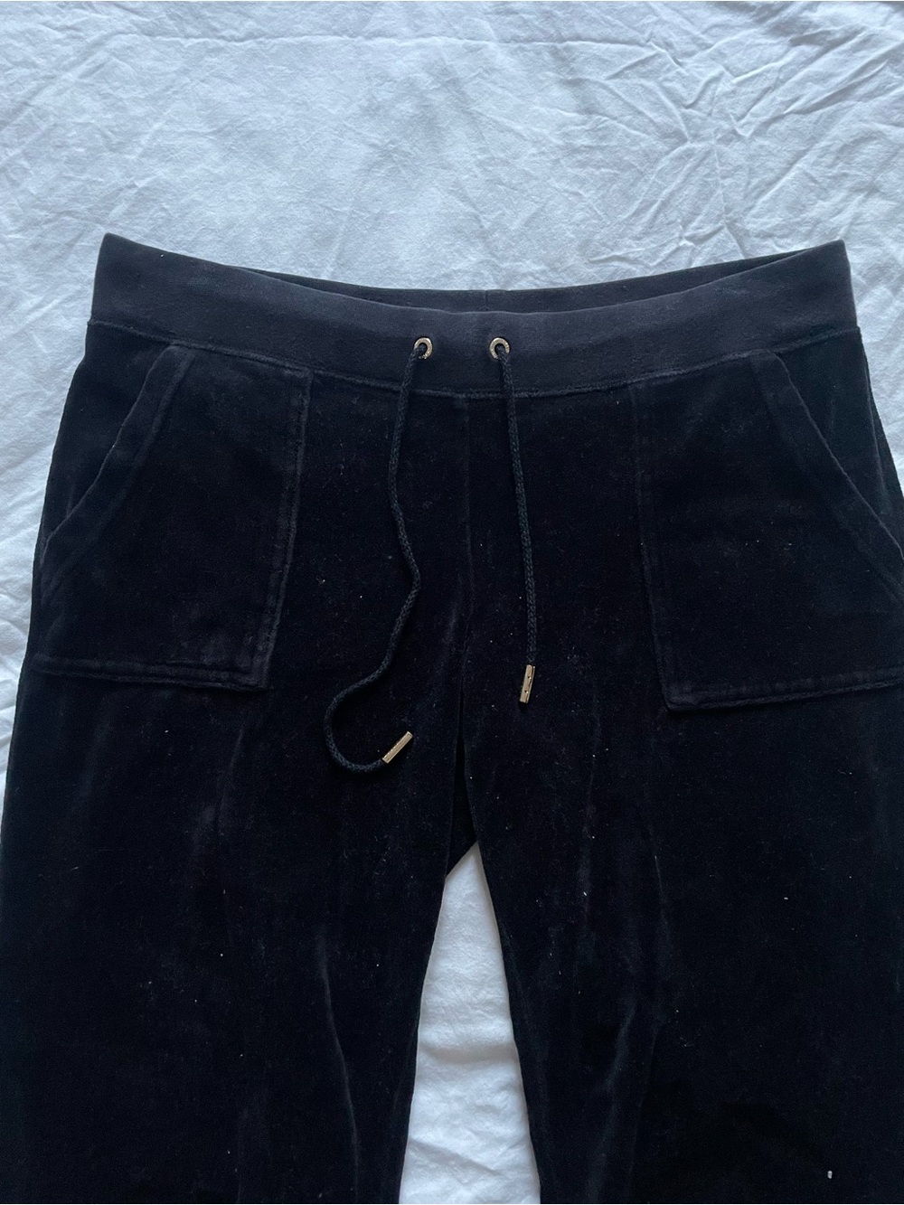 Juicy Couture black velour sweatpants with gold accents, size M